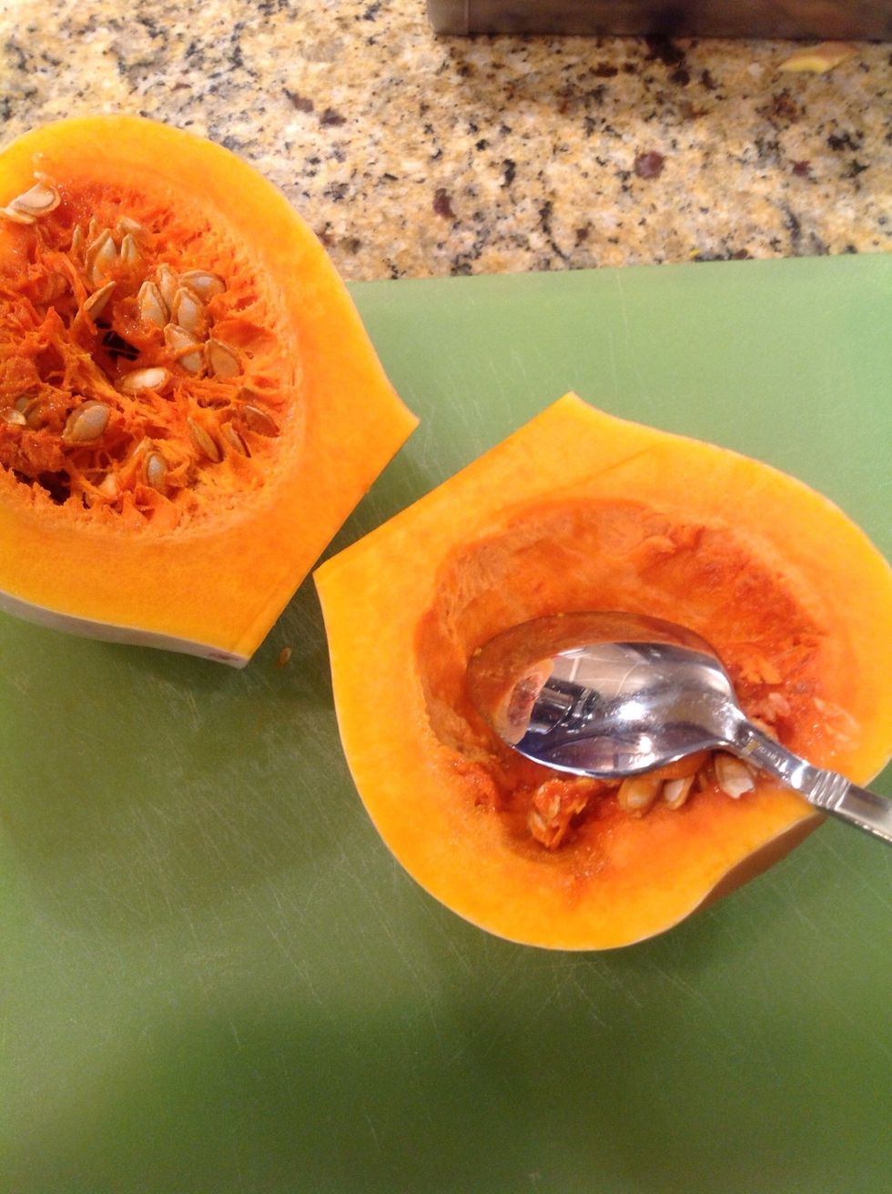 Use a spoon to scrap the pulp and seeds from the bulb end of the squash. Then dice into cubes.