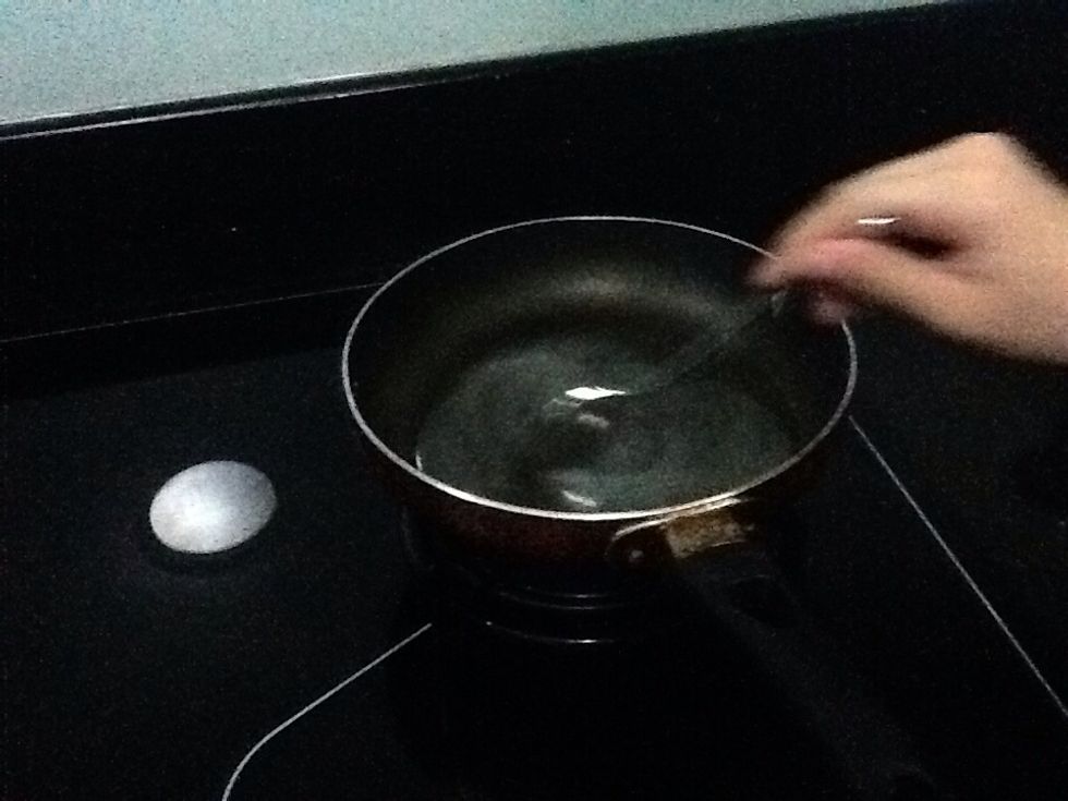 Use a spoon to stir the mixture continuously
