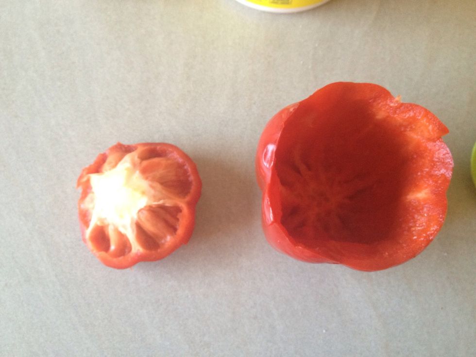 Use a spoon to take out seeds then sprinkle salt inside n set aside