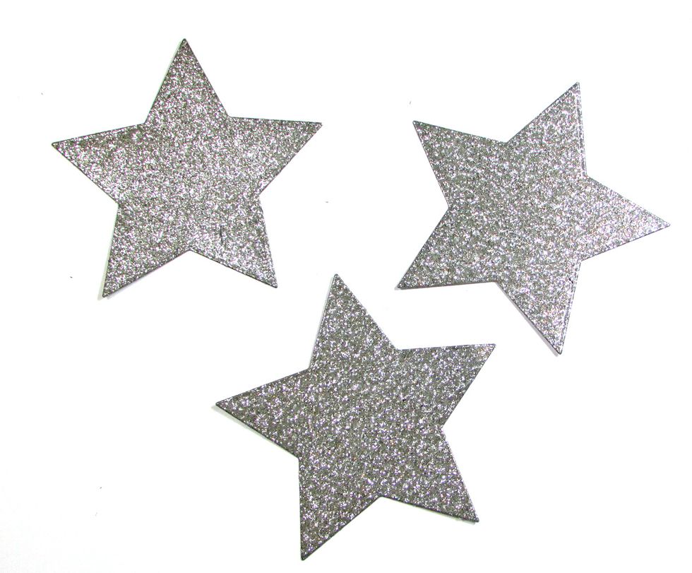 Use a star die to cut three stars from silver glitter cardstock. Each star is approximately 3 1/4" at the widest point.