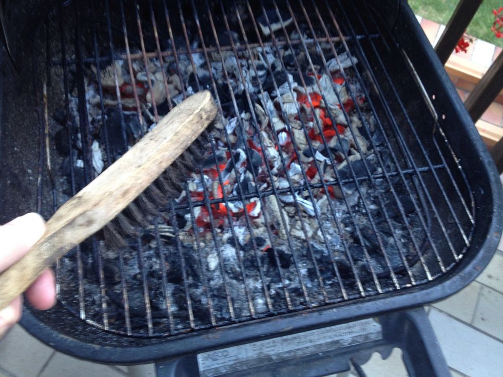 Use a steel brush to clean a bit or check out my guide in using an onion to clean your BBQ grill