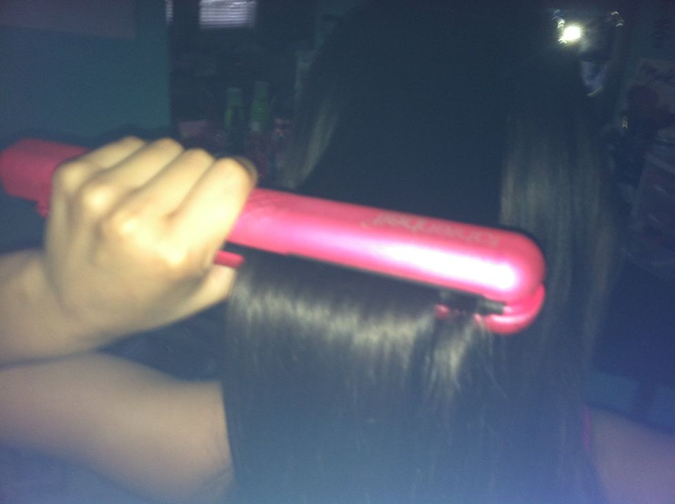 Use a straightener and straighten your hair. Section off your hair if it isn't somewhat straight from the previous steps.