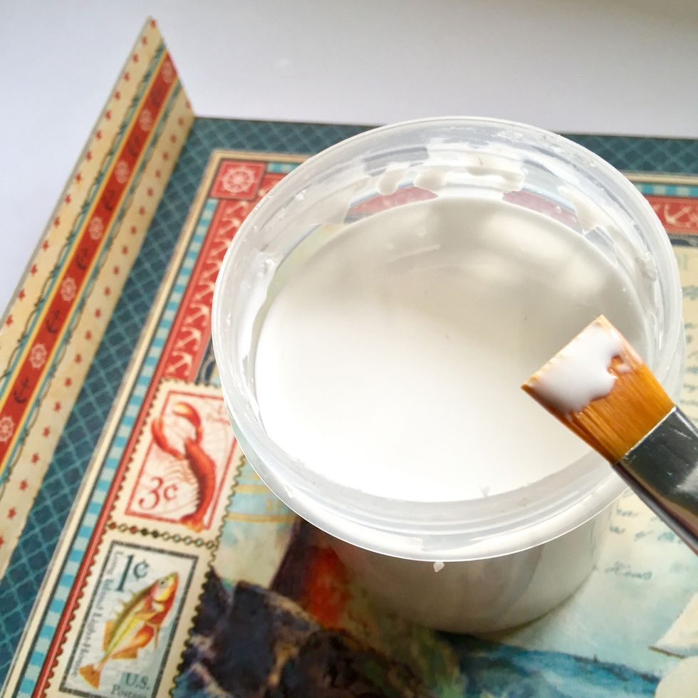 Use a strong glue to asemble the pieces to the background