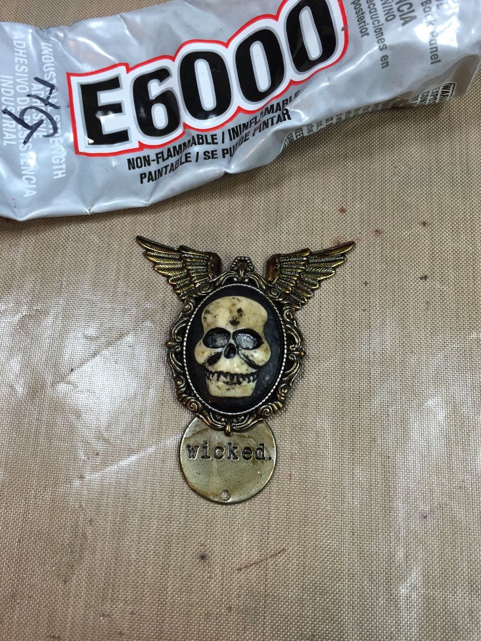 Use a strong metal glue like E6000 to start adhering pieces together. Let this set for a half hour before handling.