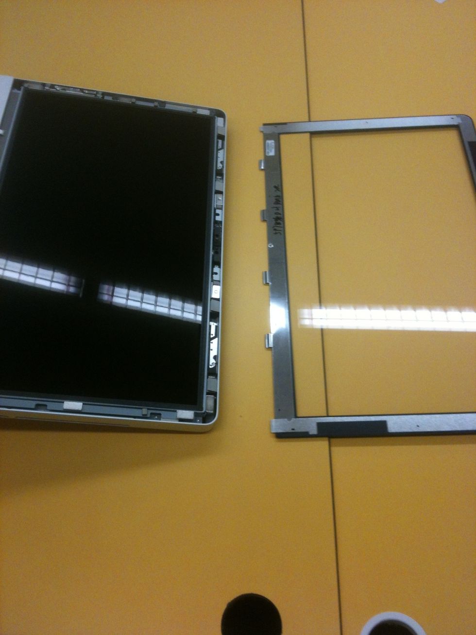 Use a sucker to pull out the screen!!