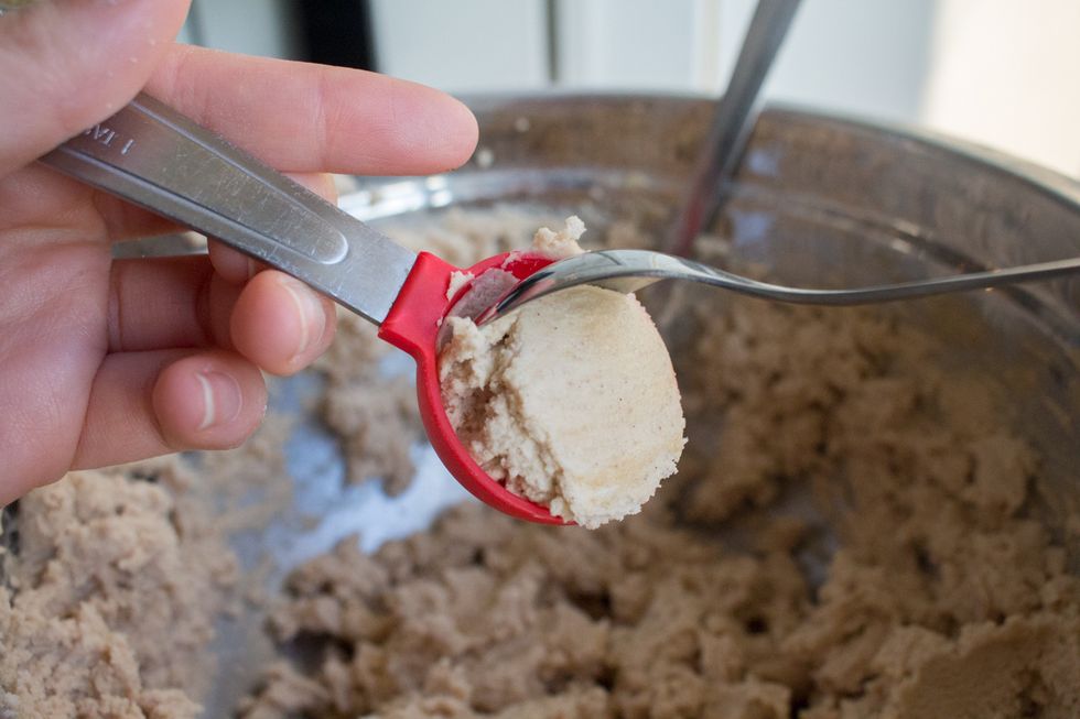 Use a tablespoon to scoop up cookie dough.