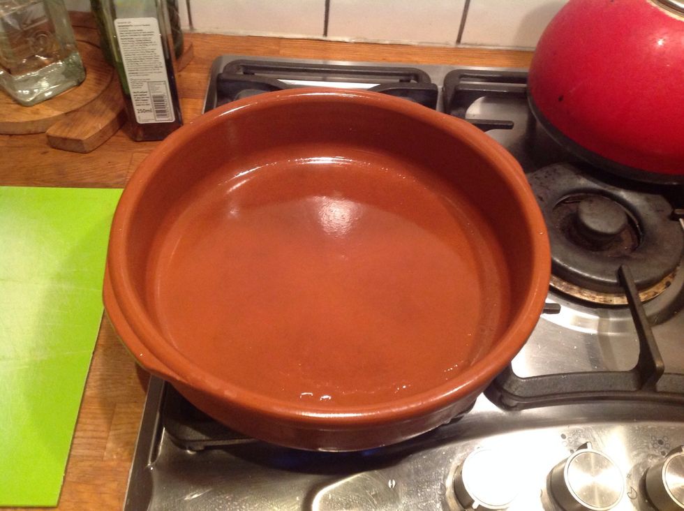 Use a Tagine if you have one - mine broke a while ago so I use an earthenware glazed dish until I can source a replacement.