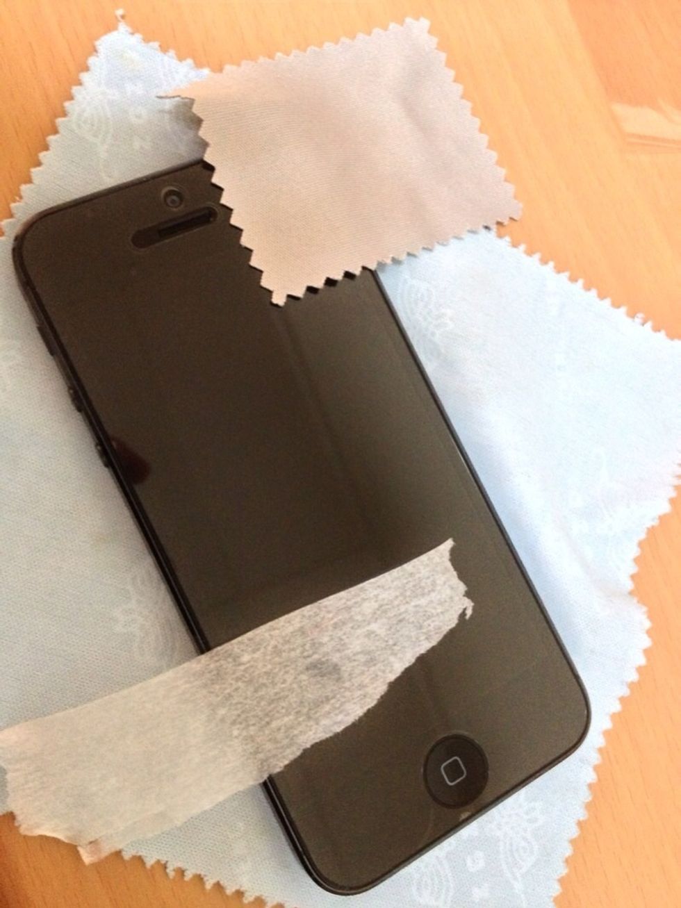 Use a tape to remove dust & dirt that can't be removed by the microfiber cloth