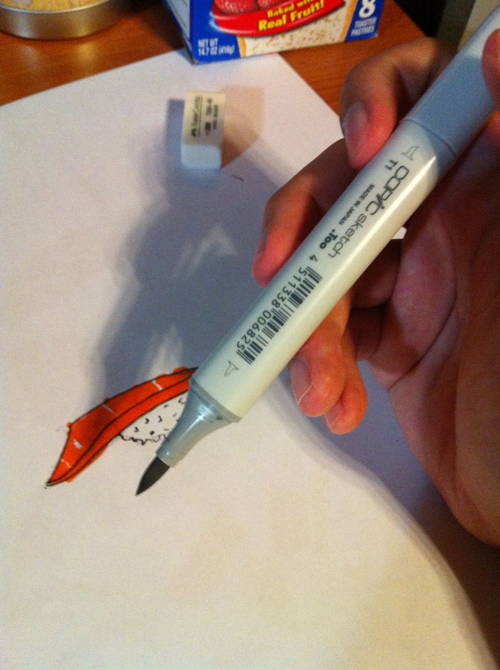 Use a toner grey marker to make a rice shadow