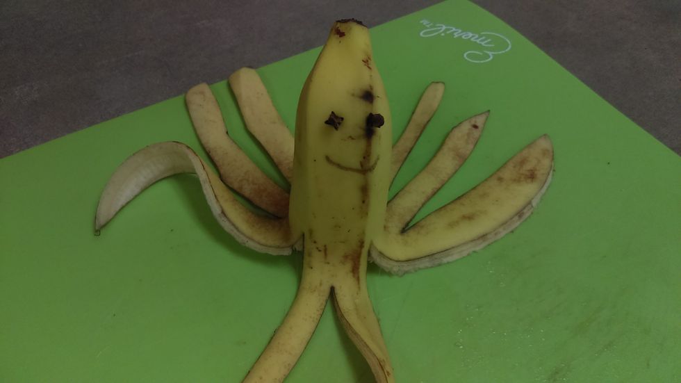 Use a toothpick to carve a smile into the banana.
