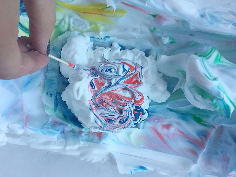 Use a toothpick to create more intricate marbling