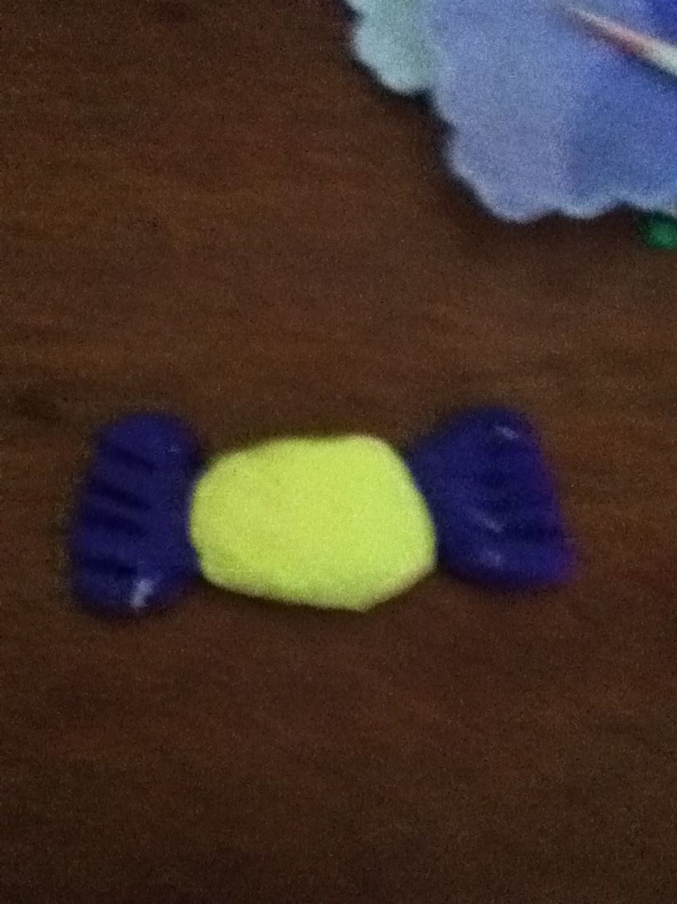 Use a toothpick to make indents like this on each purple side.