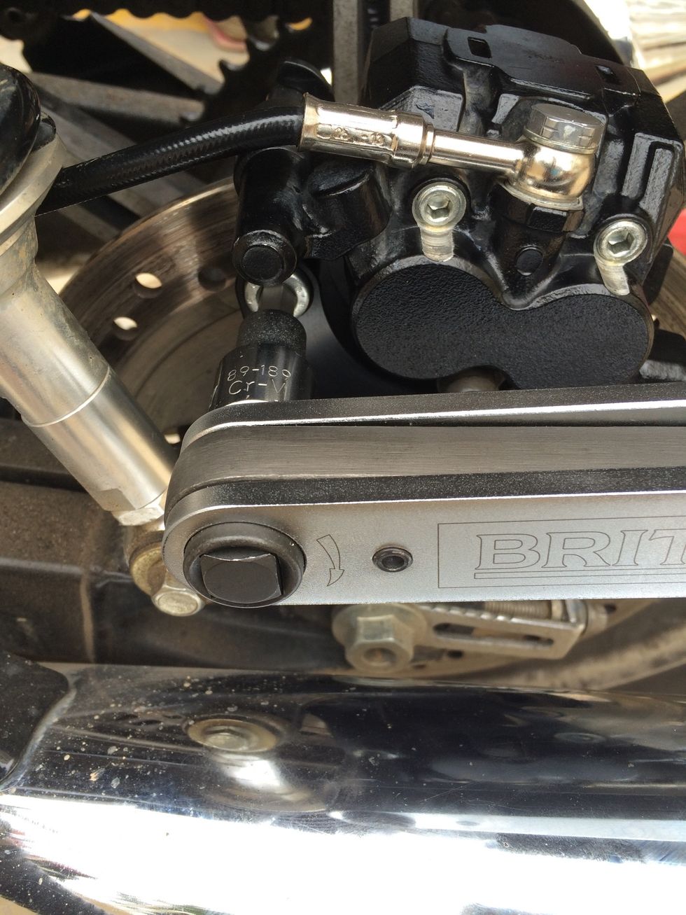 Use a torque wrench and gradually torque to 40Nm by moving through 30Nm, 35Nm. ( It is a good habit to torque up gradually, rather than jumping directly into the factory value )