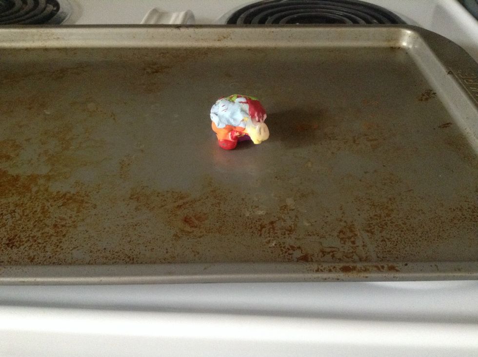 Use a towel to take your turtle out of the oven and wait for him to cool down.