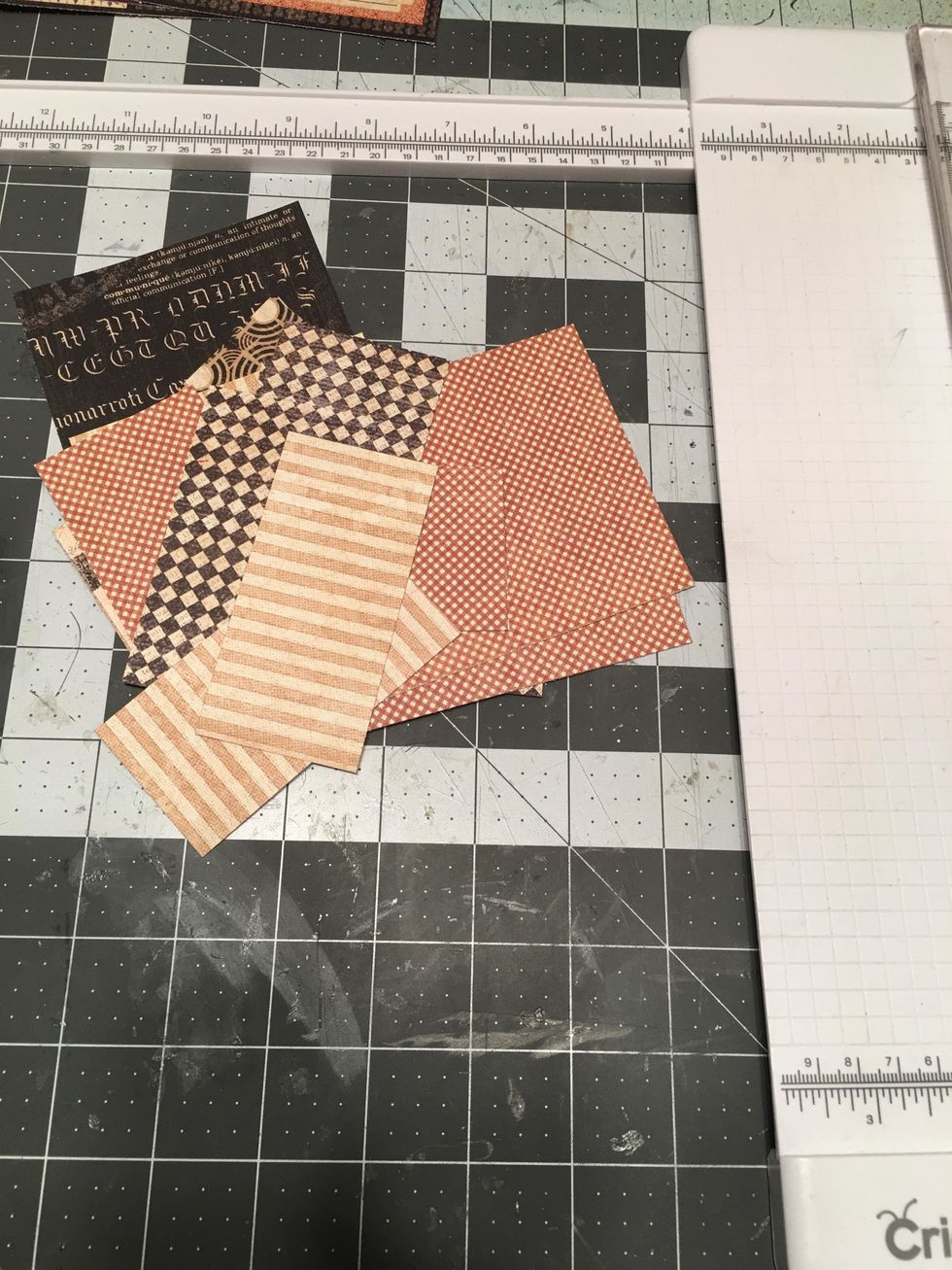 Use a trimmer & cut the patterned papers for the different sections of the inside and outside of the album. See the next six steps for patterns used and cut measurements.