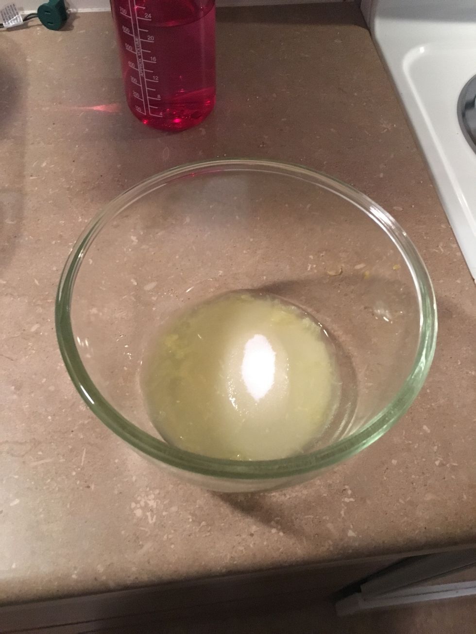 Use a vegetable peeler to remove the zest from the lemon in long strips. Combine the zest and sugar in a food processor; pulse until the zest is very finely chopped into the sugar