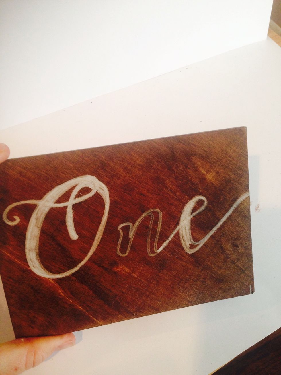 Use a white paint marker to draw over your tracing. Fill in or darken the lines until you are happy with the results.