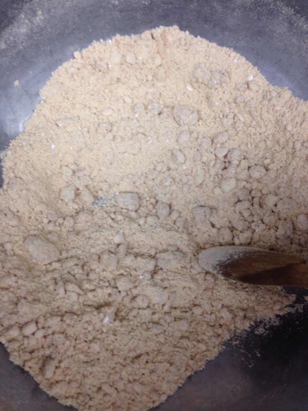 Use a wooden spoon or hands to form mixture into a dough.