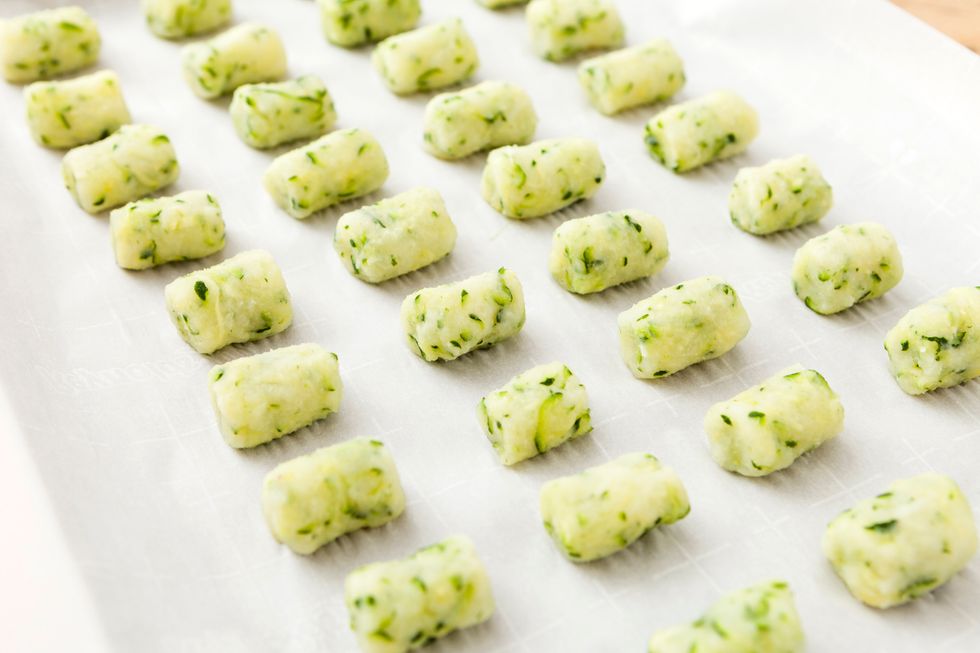 Use about 1 tablespoon per tater tot. Repeat until you have filled the sheet. Place sheet in the freeze for 10 minutes to firm up your tater tots.
