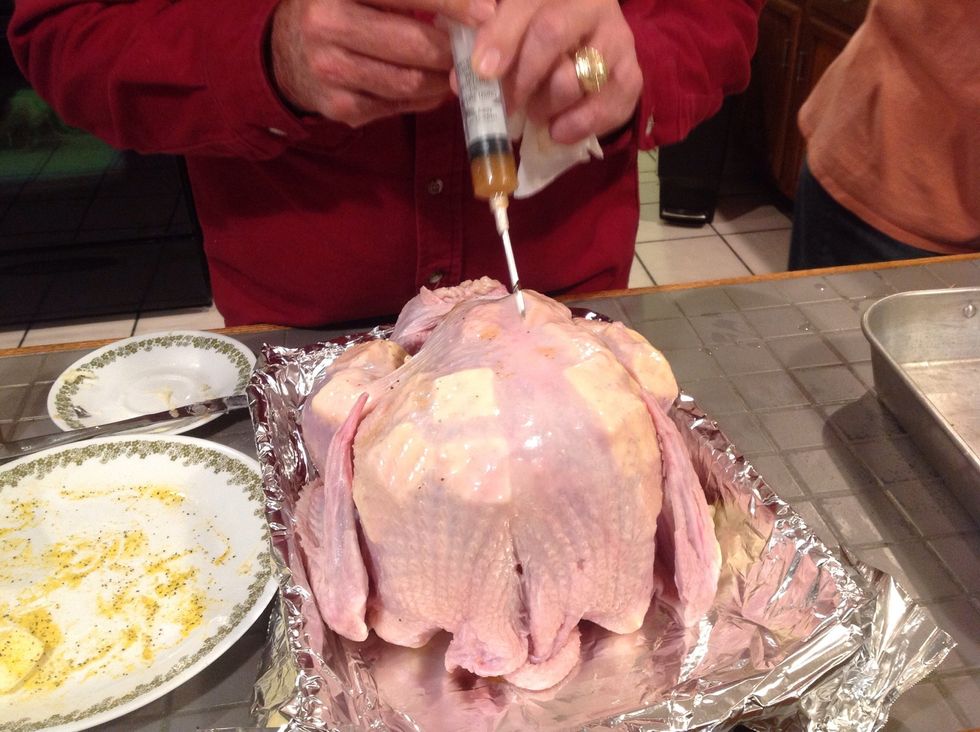 Use almost the entire bottle for injecting the turkey. Save about 1/4 cup.