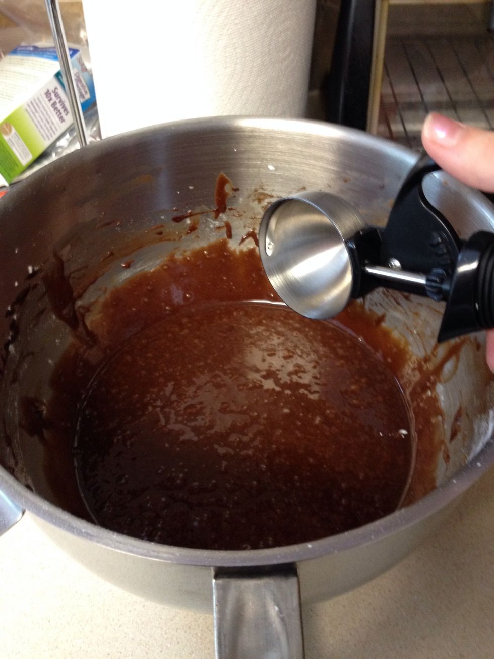 Use an ice cream scoop to evenly distribute the batter into the cupcake tin