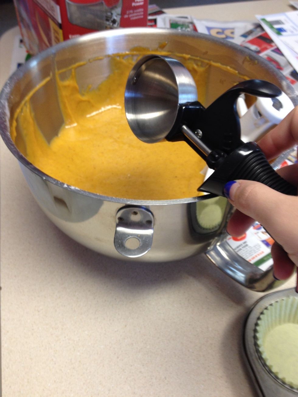 Use an ice cream scoop to get equal portions of the batter