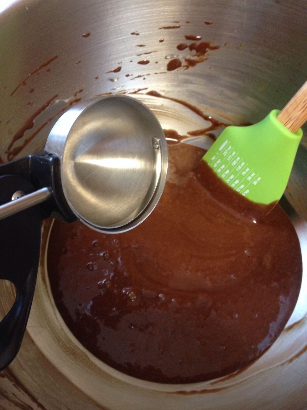 Use an ice cream scoop to portion the batter into the cupcake tin