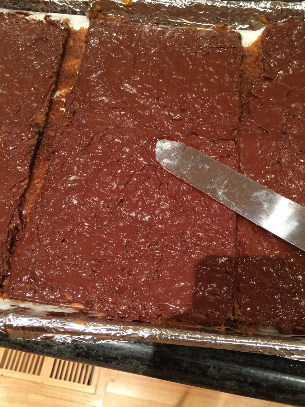 Use an offset spatula to spread the chocolate in an even layer.