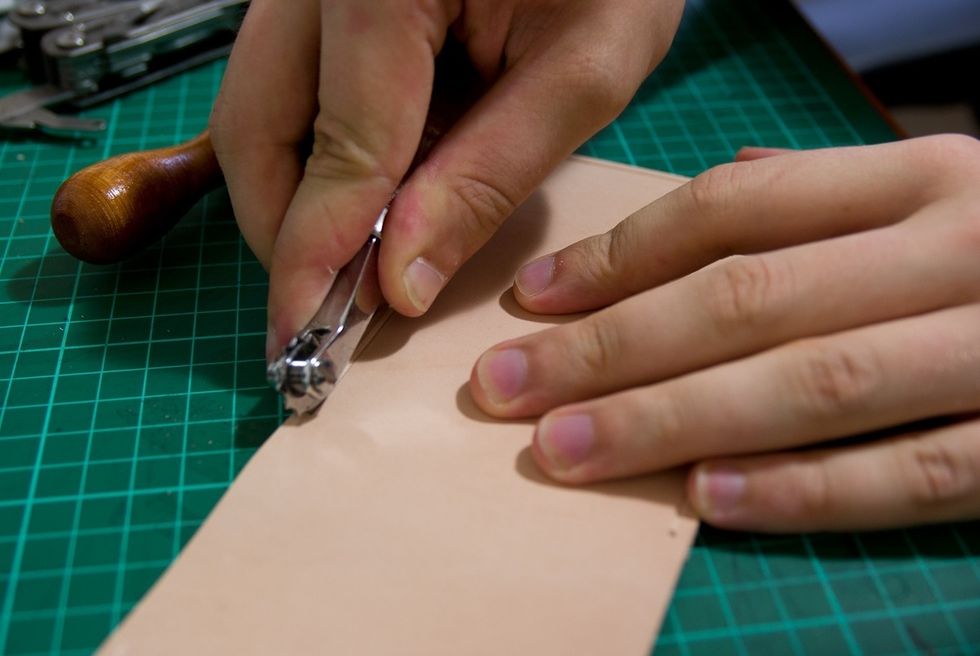 Use an over stitch wheel to mark the even spacing for your stitches.