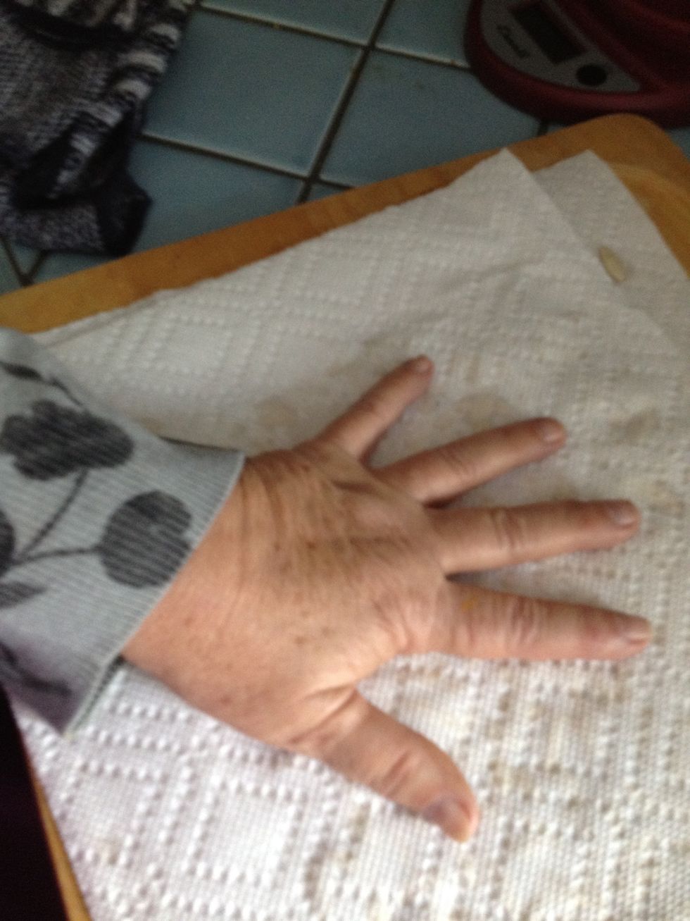 Use another piece of paper towel to pat them down.