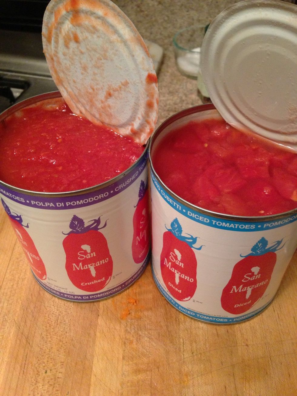 Use any San Marzano tomatoes you like, hand-crushed if using whole. I opted for one crushed and one diced.