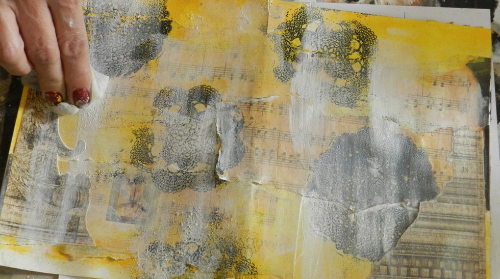 Use baby wipes again to remove the gesso.