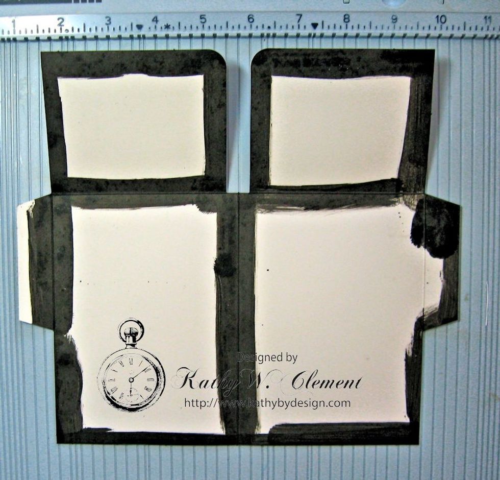 Use Black Soot Distress Paint to cover all the tabs, edges and fold lines on both the front and back of the base. Let dry completely. Make a 2nd folder in this same way.