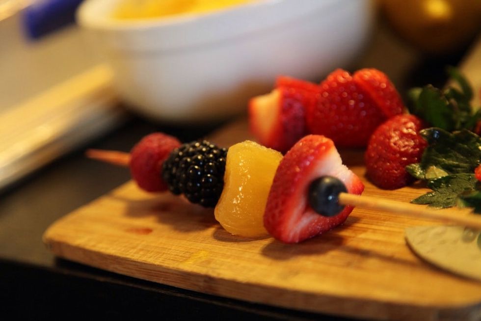 Use blueberries as end caps to keep your fruit from falling.