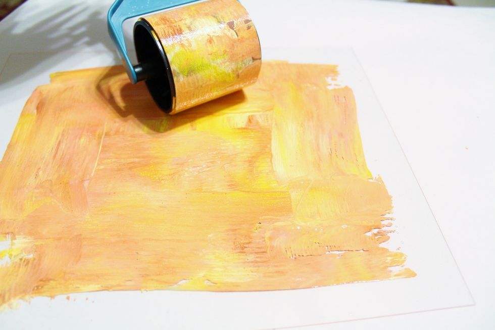 use Color Wheel and Handle to gently blend inks and spread over Plate...