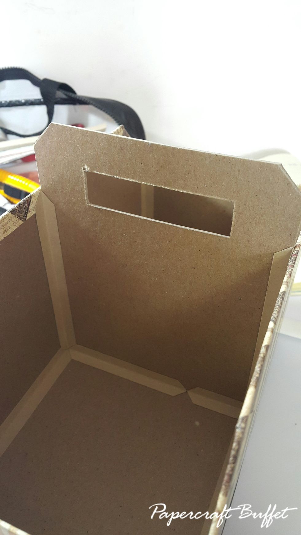 Use connecting strips on both sides and adhere into the box, as shown