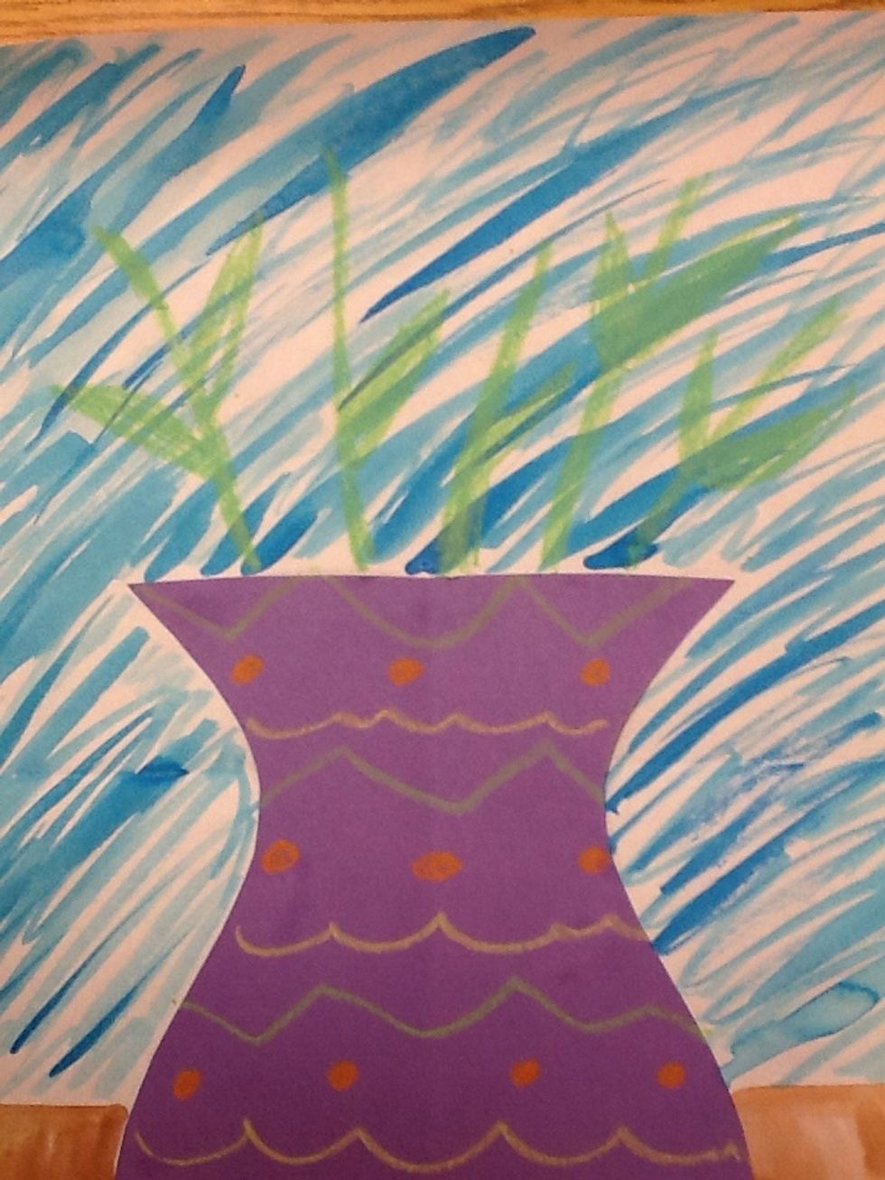 Use crayons to draw stems for your 5 flowers.