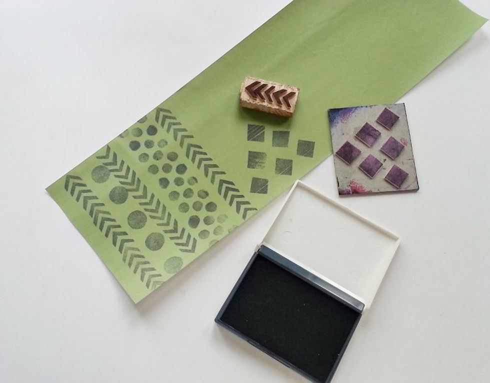 Use different shaped stamps to create customized pattern on the prepared paper. I kept a small gap for a label. The customized paper is ready!
