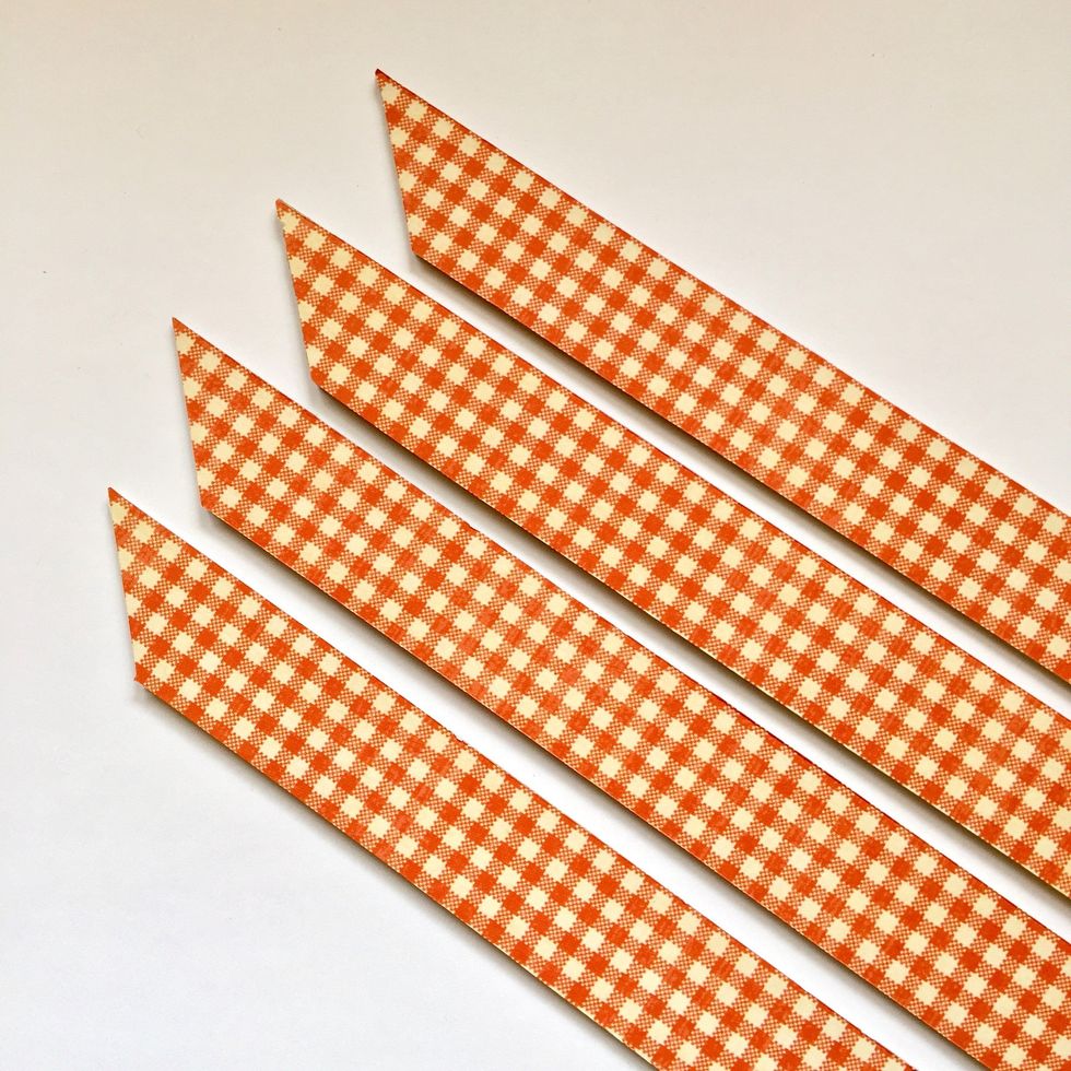 Use double sided tape to cover them with paper, only one side.