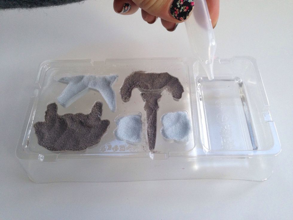 Use dropper to fill rectangle part of mold to line with water