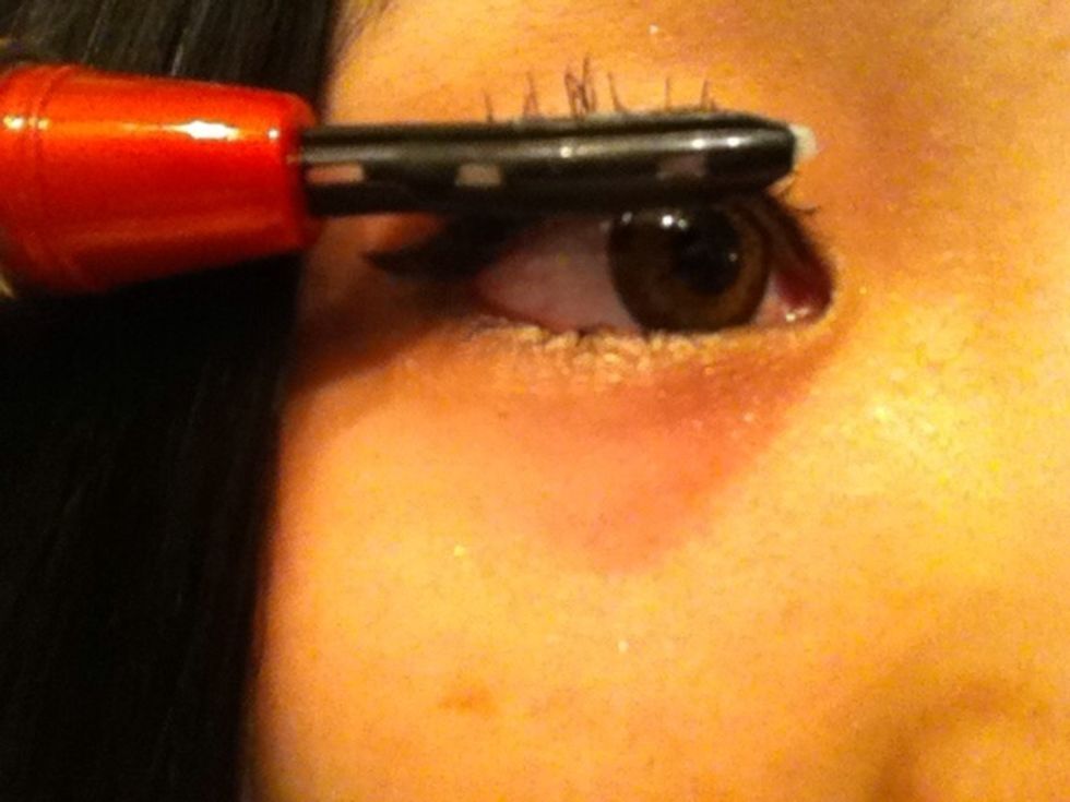 use electlic curler. start from the roots of eyelush. wait 3sec at least.