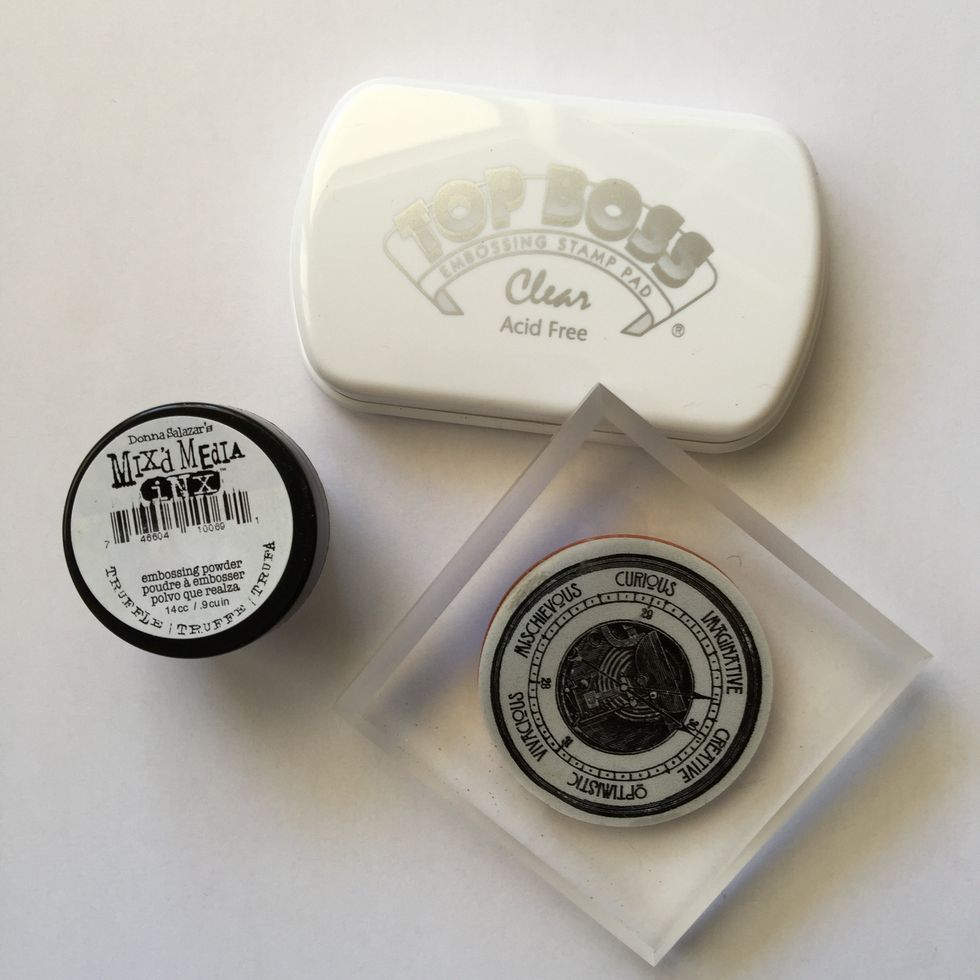 Use embosing stamp pad and a stamp to decorate the cardstock numbers.