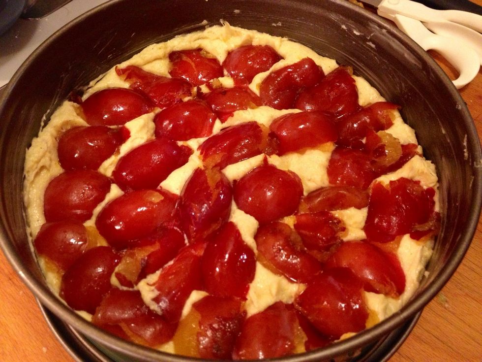 Use enough plums to cover the batter.