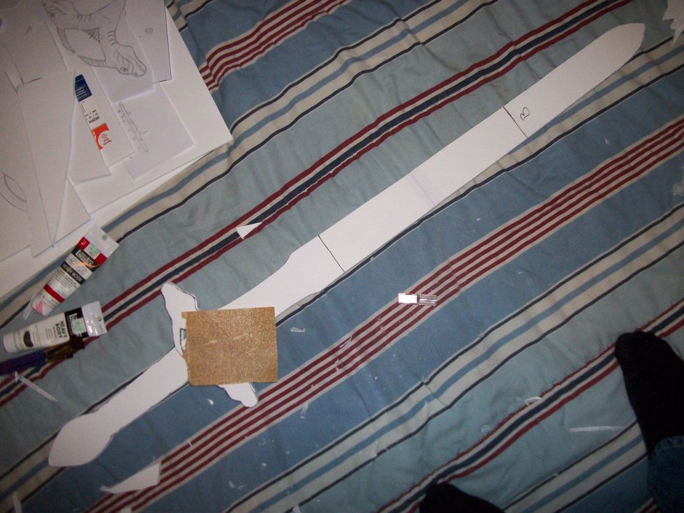 Use exacto knife and sand paper to smooth and even your weapon.