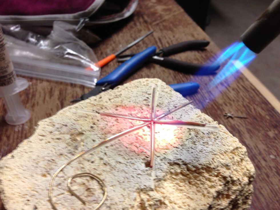 USE EXTREME CAUTION. The torch is dangerous enough, but the fumes are also very dangerous. Use a ventilation system or open air.  Then, torch until the solder flows.