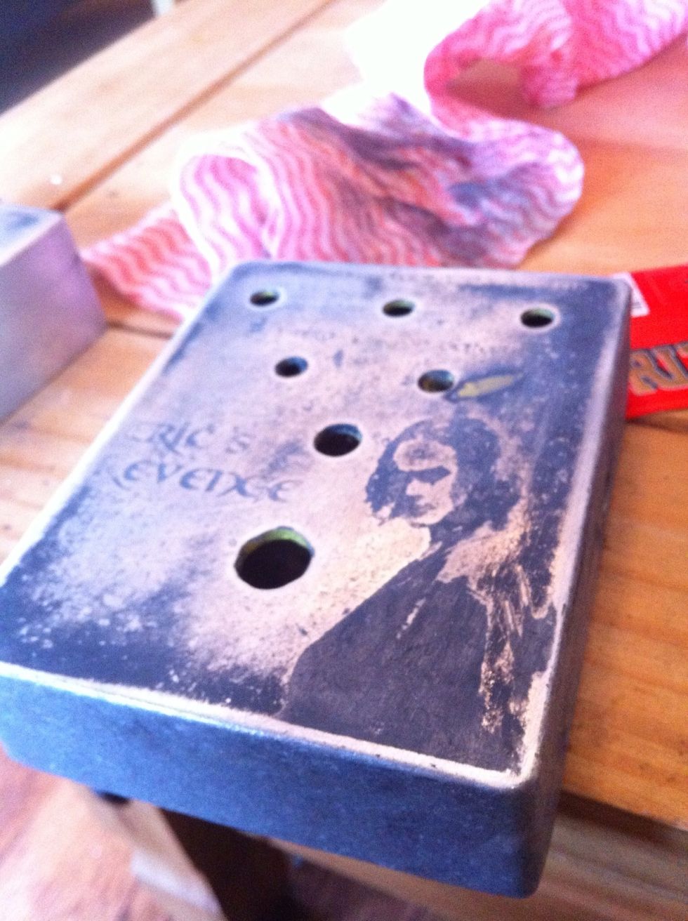 Use fine sandpaper to remove the toner, being careful not to damage the etch.