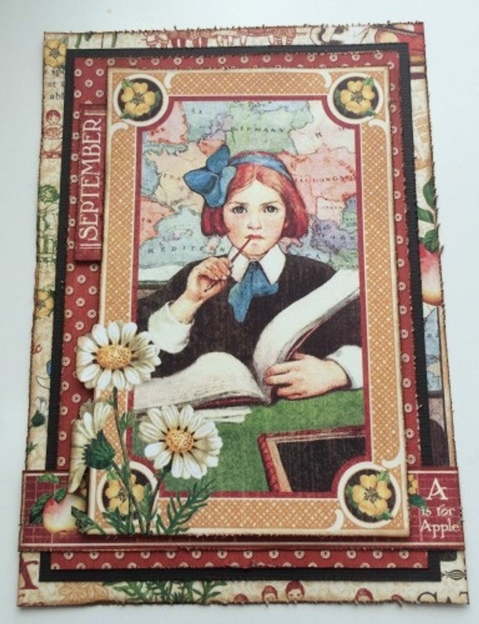 Use foam squares to adhere the girl image to the red and white paper. Make sure there is a 1/4" border on the right and left of the girl image.