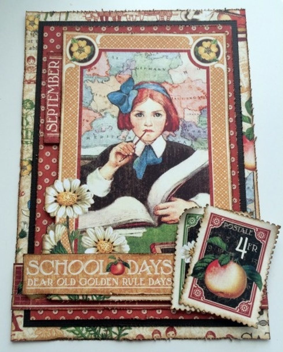 Use foam squares to adhere the postage stamps to the right of the School Days sentiment. Once the postage stamps have been adhered, roll the top left and right hand corners of the postage stamps.