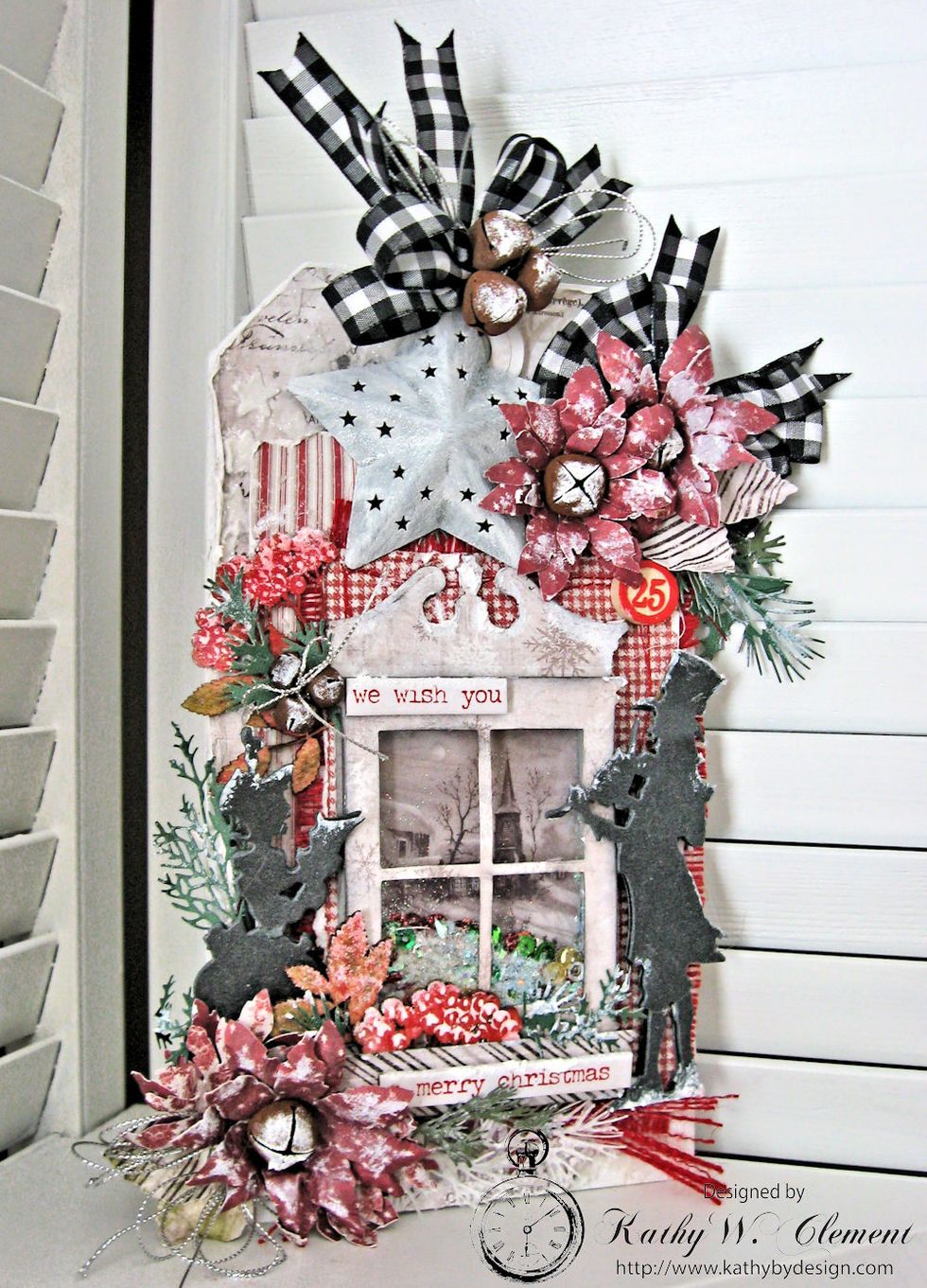 Use foam tape to add carolers, greenery and florals to tag. Color Kaisercraft Berries &Twigs with Distress Crayons. Add to box and tag. Add painted metal star, ribbon, bells, etc.