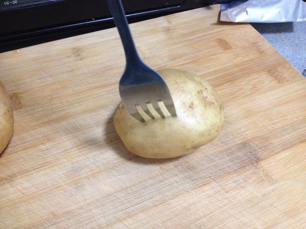 Use fork to make some holes on the surface to make sure the steam can come out.